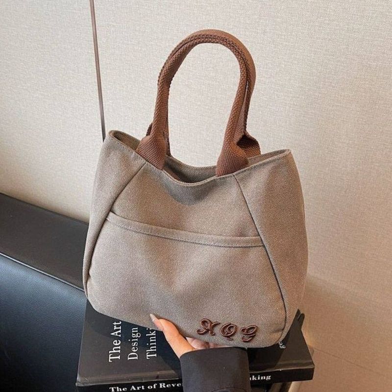キャンバス 刺繍デザイン ポケット付き ハンドル付き トートバッグ